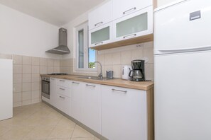 Cuina privada | Frigorífic, forn, placa de cuina i cafetera exprés 