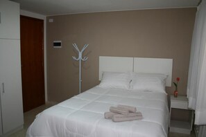 Premium bedding, pillow-top beds, minibar, individually decorated