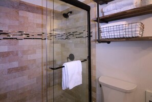 Combined shower/tub, hair dryer, shampoo