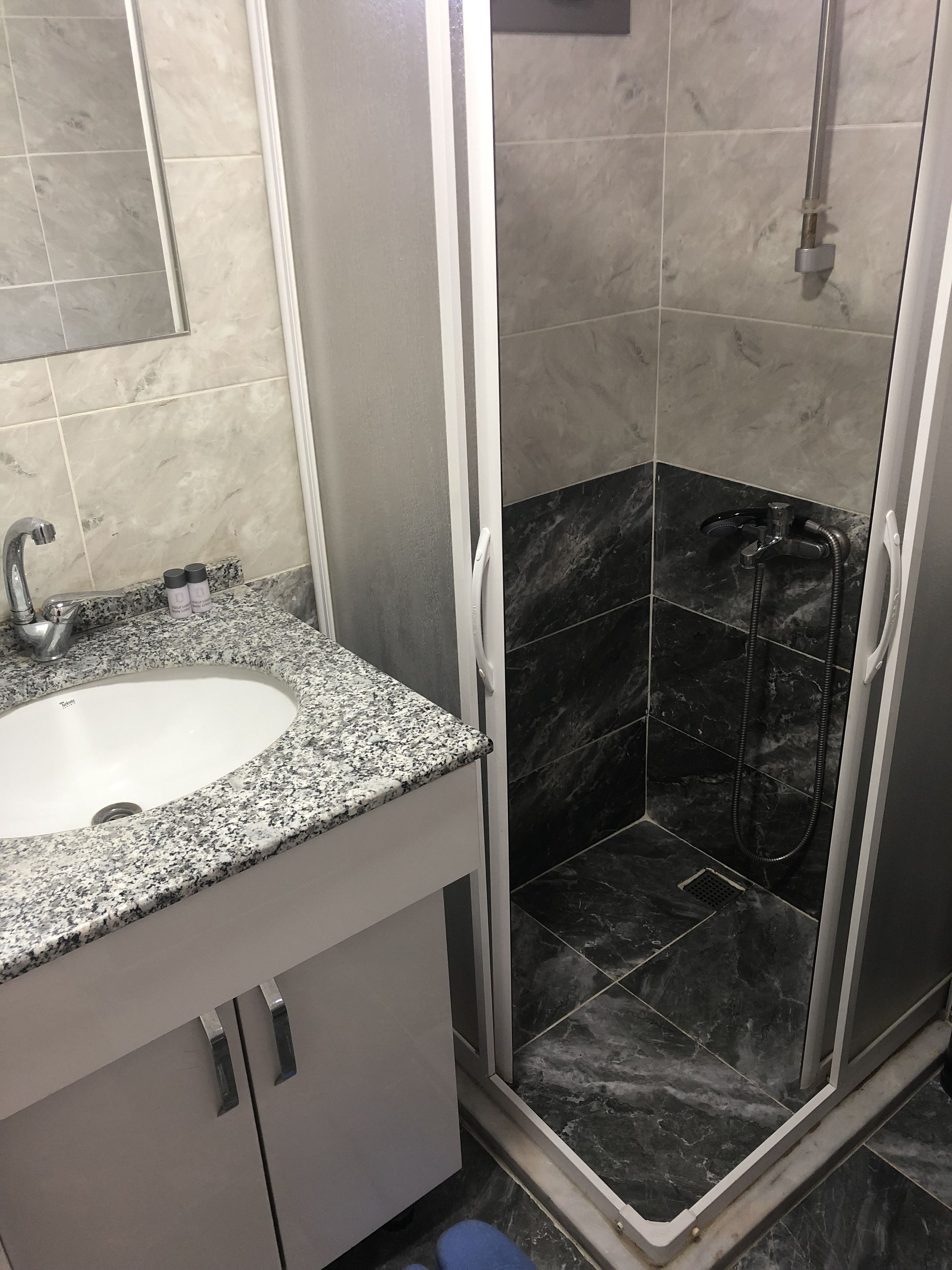 Superior Apartment | Bathroom | Shower, hair dryer, slippers, soap