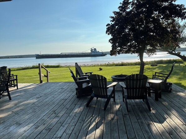 Outdoor dining - Freighters in front yard!  Private Sandy Beach - Large Deck - Best View on River (Sault Ste. Marie)