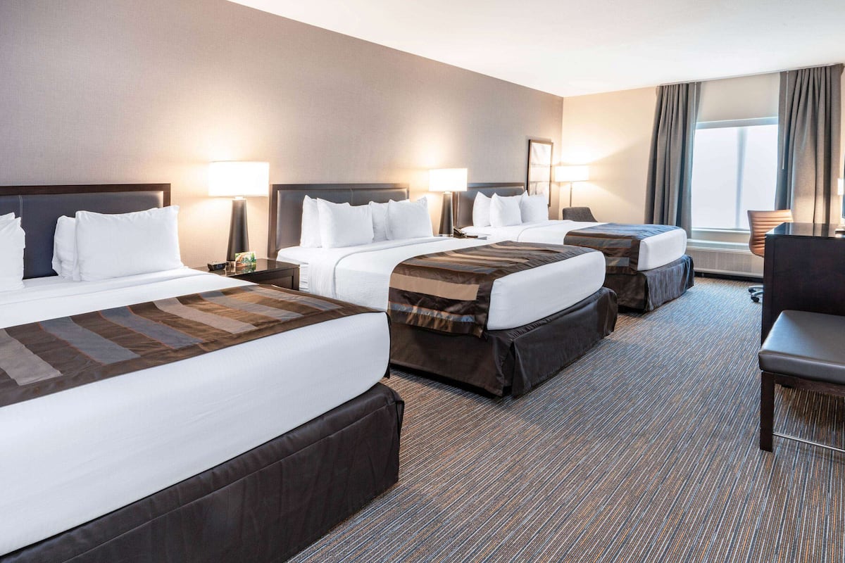 room, multiple beds, non smoking | 1 bedroom, desk, laptop workspace, iron/ironing board