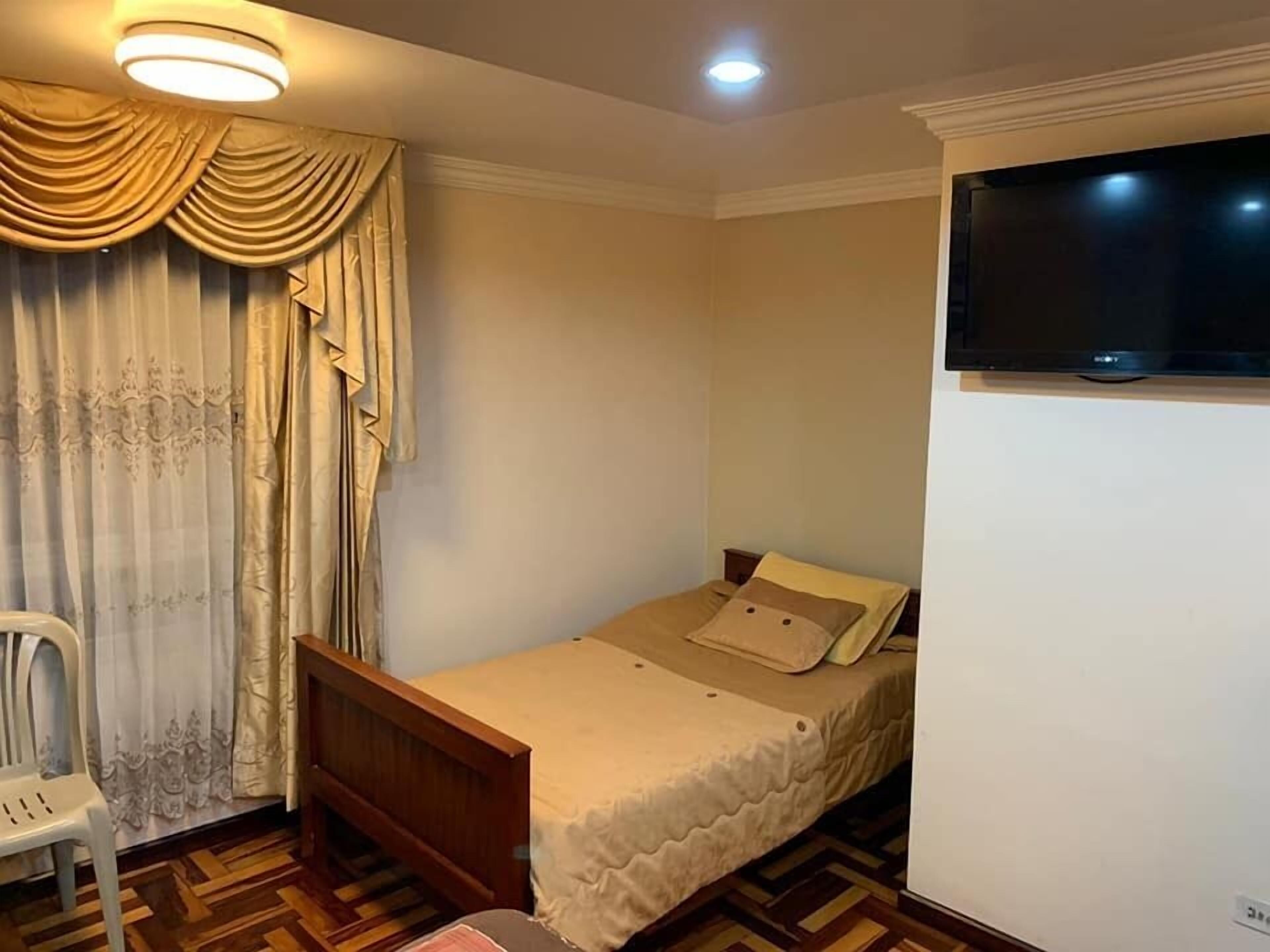 Desk, blackout drapes, soundproofing, free WiFi
