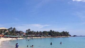 On the beach, white sand