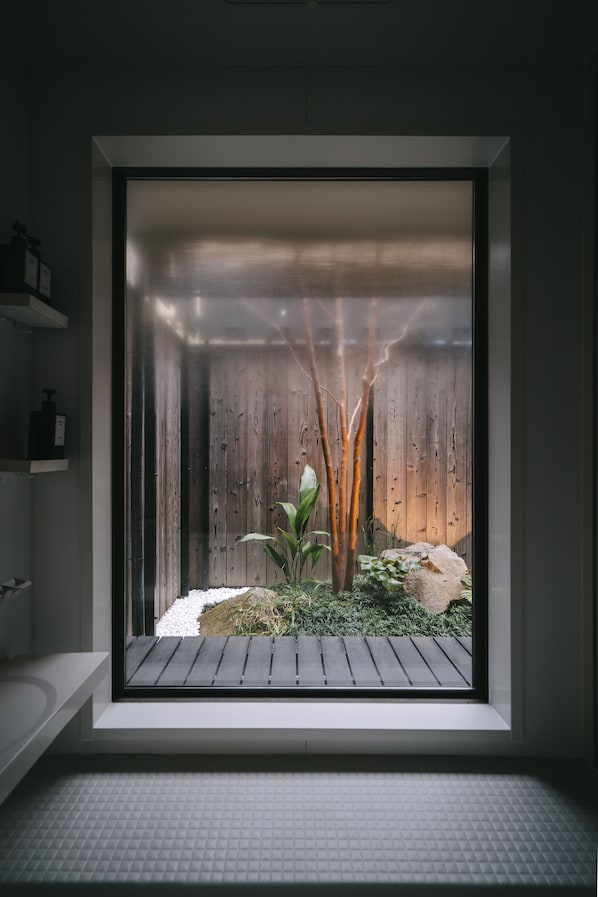 Private Vacation Home | Bathroom | Separate tub and shower, free toiletries, hair dryer, slippers