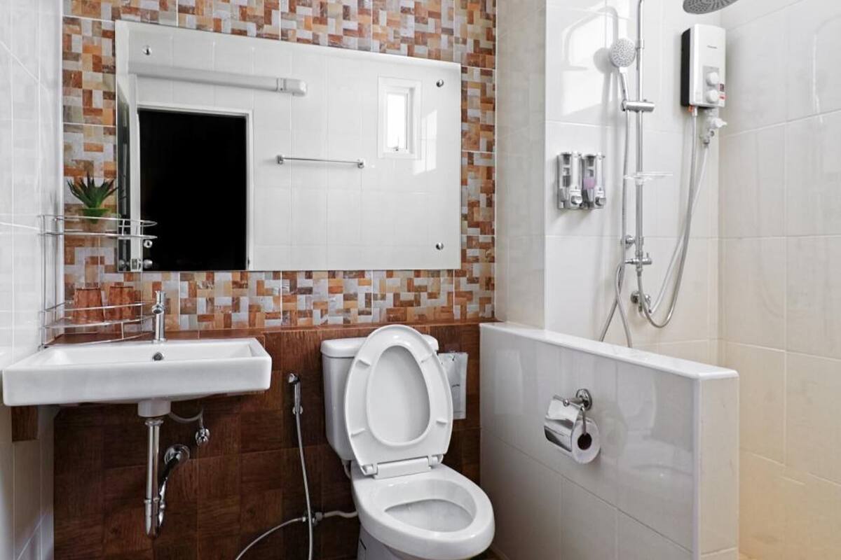 shower, rainfall showerhead, hair dryer, towels