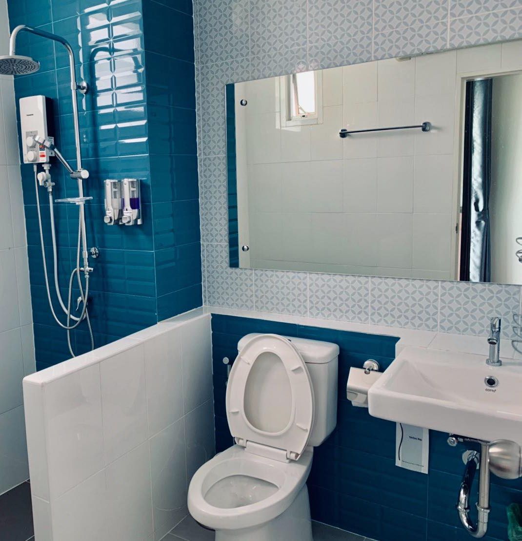 standard twin room | bathroom | shower, rainfall showerhead, hair dryer, towels