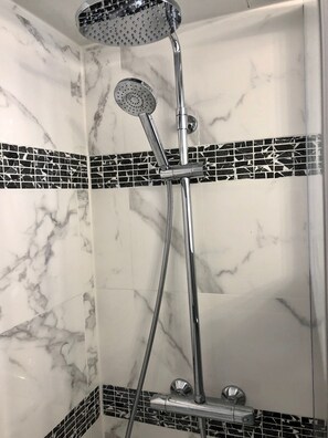 Hair dryer, towels, soap, shampoo