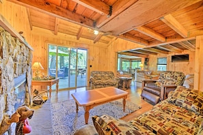 Up to 7 guests can enjoy the cozy cabin accommodations.