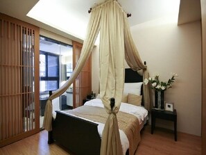 Family Apartment, 2 Bedrooms, Smoking (Romantic) | 2 bedrooms, down duvets, individually decorated, free WiFi