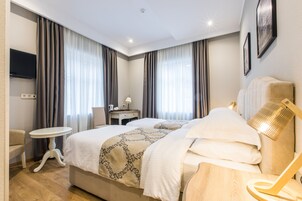 Premium bedding, minibar, in-room safe, desk