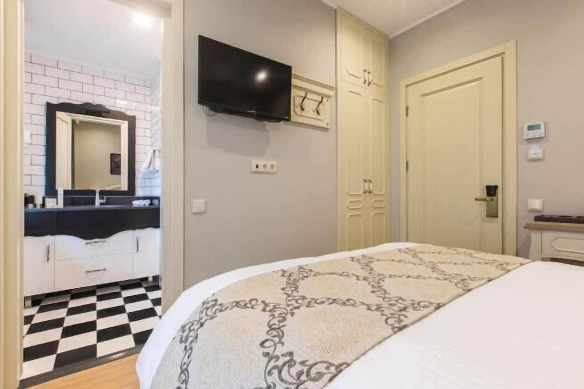 1 quarto, roupas de cama premium, frigobar, cofres nos quartos