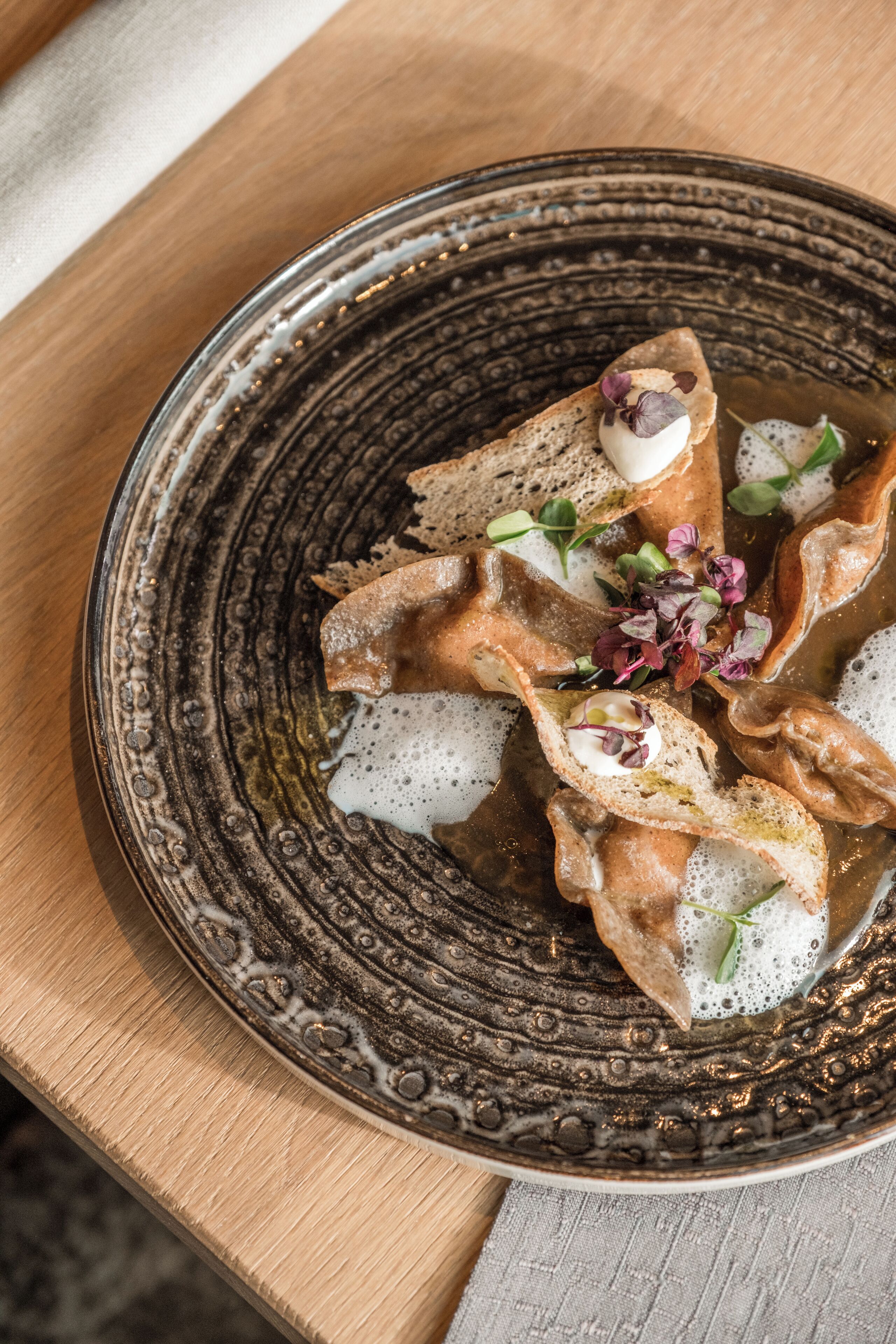 A plate of food with various toppings and garnishes.