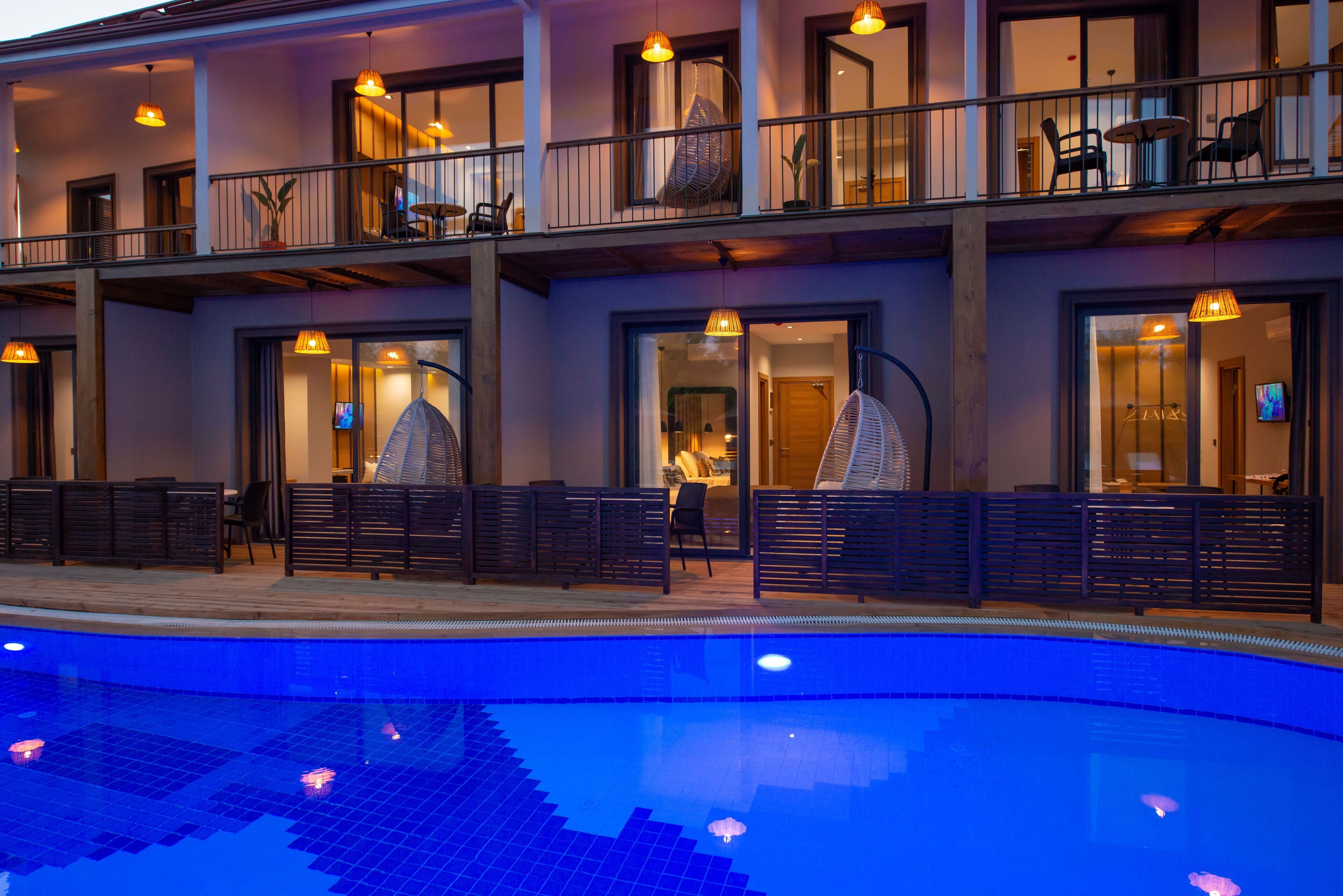 seasonal outdoor pool, open 8:00 am to 8:00 pm, pool umbrellas