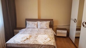 Apartment, 3 Bedrooms | In-room safe, soundproofing, iron/ironing board, free WiFi