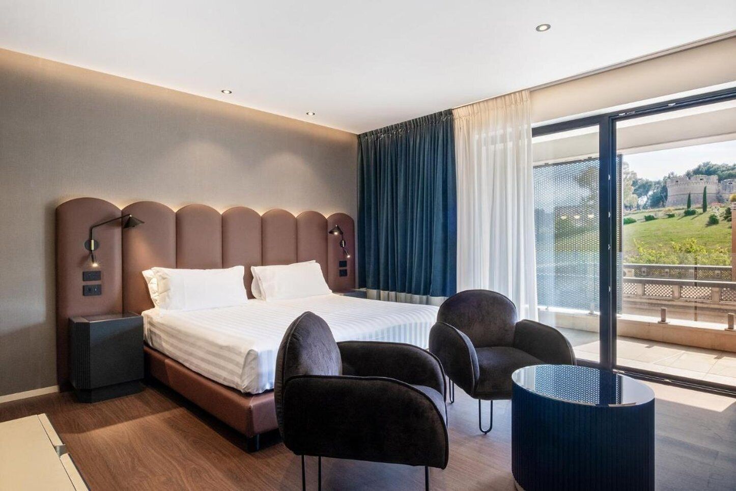 Premium bedding, down comforters, pillowtop beds, minibar