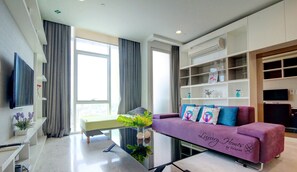 Suite Supérieure, 2 chambres | Coin séjour | TV connectée