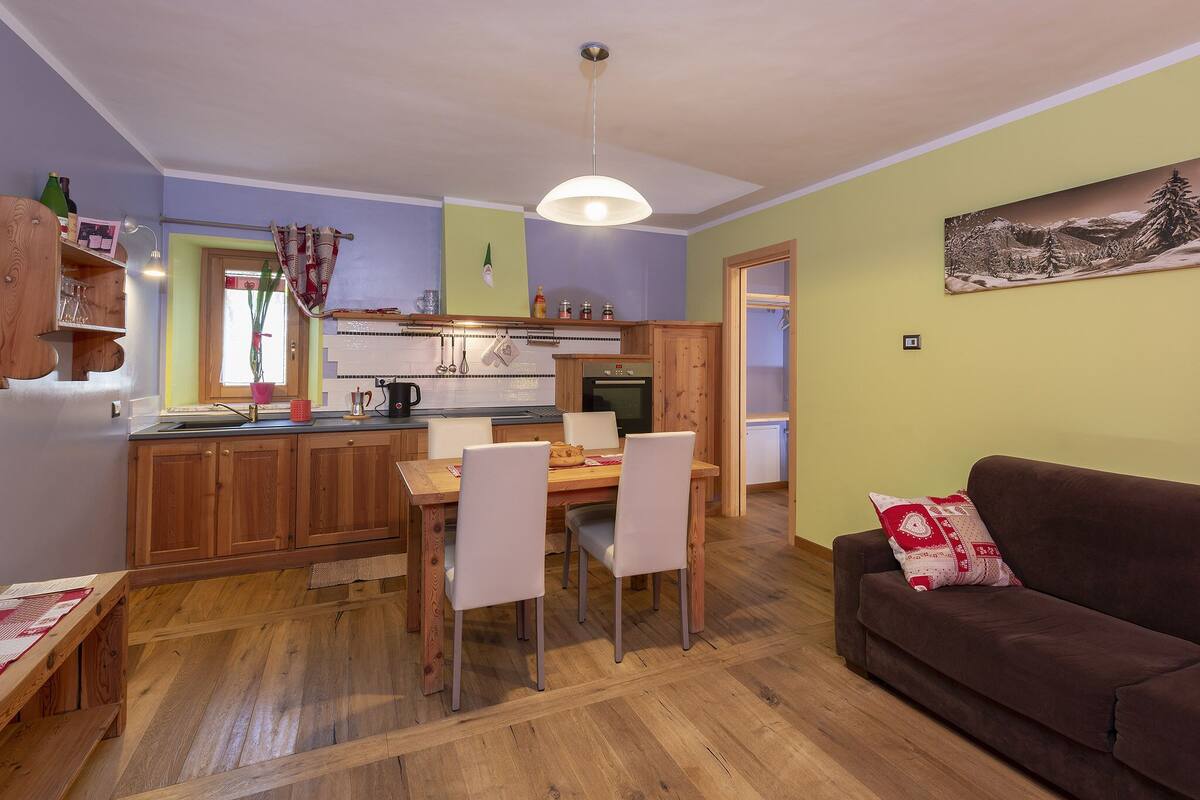 Apartment, 1 Bedroom (La Vite) | Living area | LED TV, heated floors