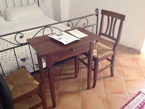 Desk, free cots/infant beds, free WiFi, bed sheets