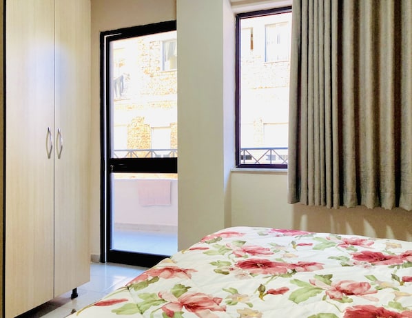 Basic Double Room, 1 Queen Bed, City View | Iron/ironing board, free WiFi, bed sheets