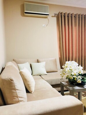 Apartamento família | Ferros/tábuas de passar roupa, Wi-Fi de cortesia, roupa de cama