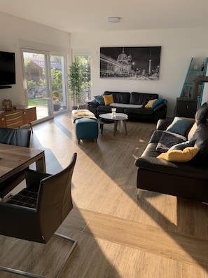 TV, fireplace - Exclusive large holiday home apartment Baltic Sea Usedom Island water view  (Loddin)