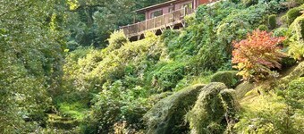 Riverside Lodge with Hot Tub. Walk to Lynton & Lynmouth Towns. Free Parking.