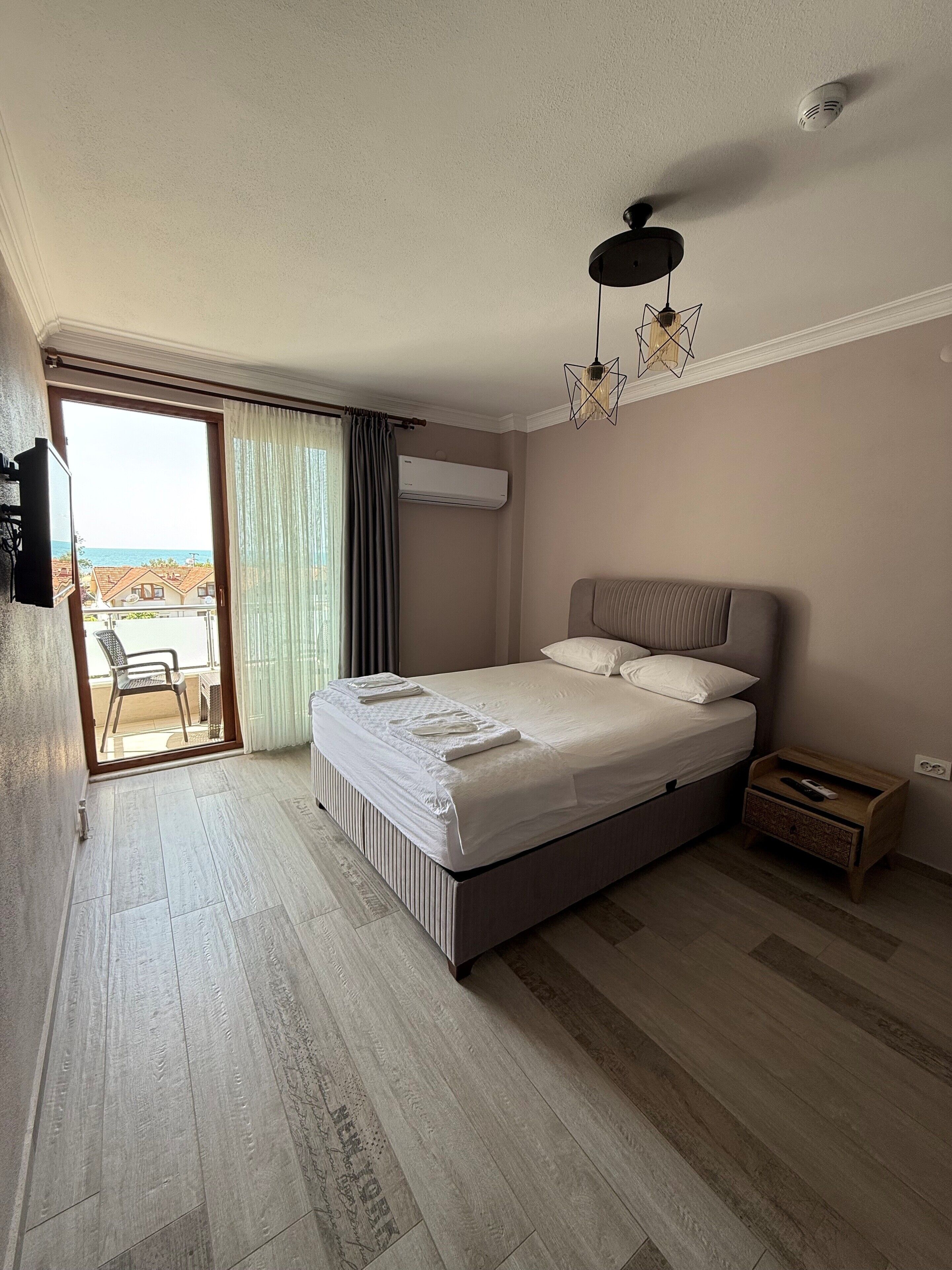 family room | 2 bedrooms, blackout curtains, bed sheets