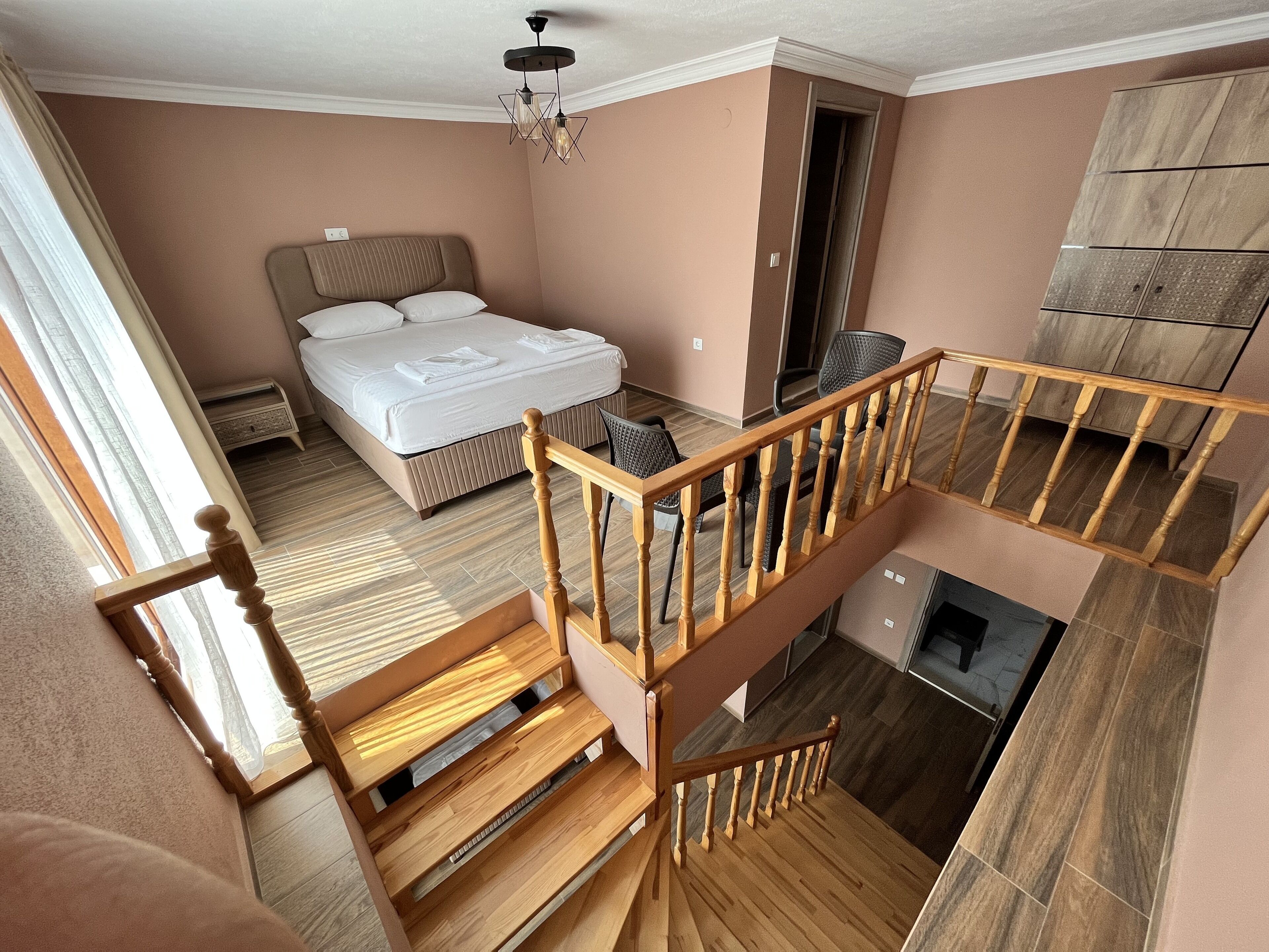 deluxe duplex | 2 bedrooms, blackout curtains, bed sheets