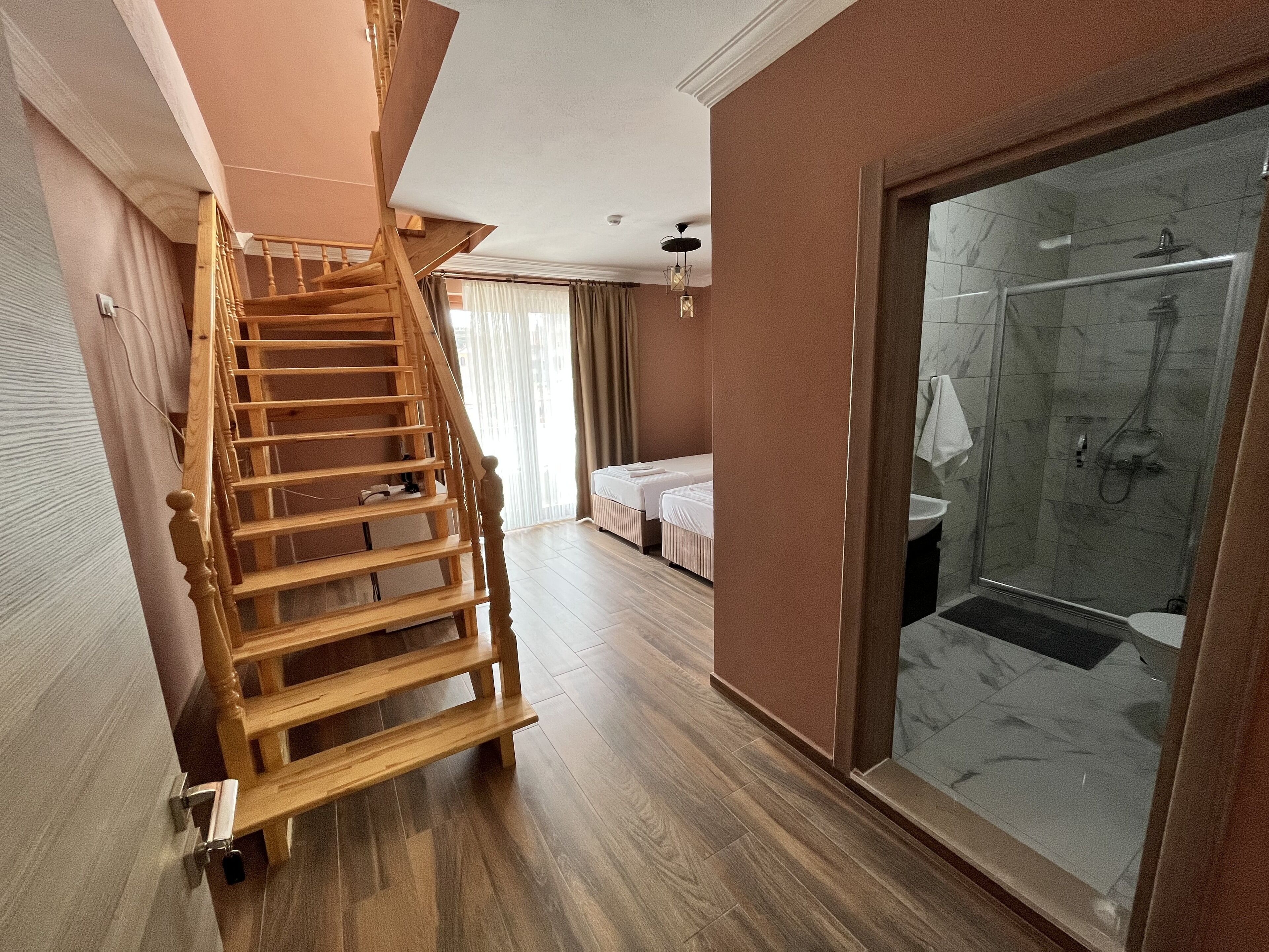 deluxe duplex | 2 bedrooms, blackout curtains, bed sheets