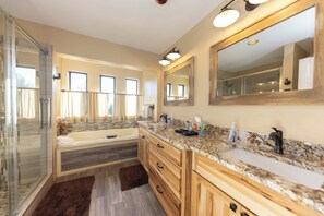 Combined shower/bathtub, jetted bath, hair dryer, towels
