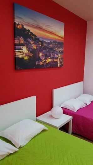 Economy Quadruple Room | Minibar, free WiFi, bed sheets