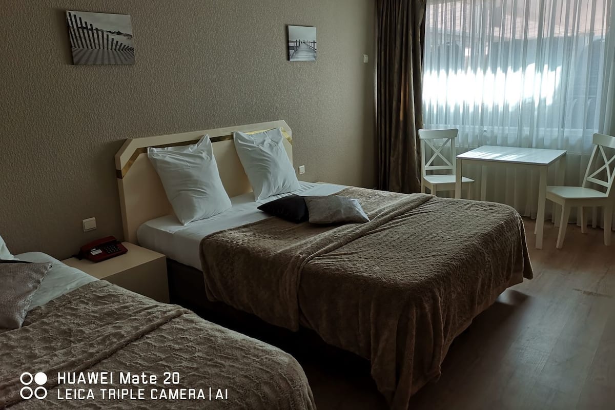 Classic Triple Room | 1 bedroom, minibar, desk, blackout drapes