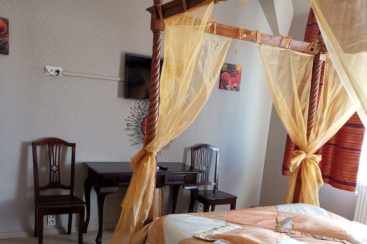 Family Quadruple Room | 1 bedroom, minibar, desk, blackout drapes
