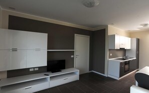 Standard fyrbäddsrum - pentry | 1 sovrum, arbetsyta för laptop, ljudisolering och barnsängar