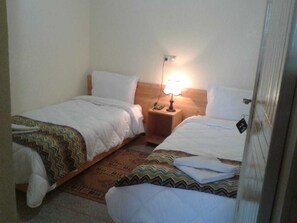 Twin Room, 2 Twin Beds | Blackout drapes, free WiFi, bed sheets