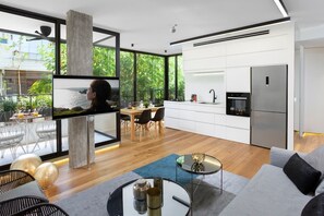 Comfort Apartment | Living area | Flat-screen TV