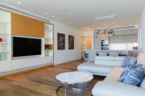Deluxe Apartment | Living area | Smart TV - Luxury 2BR on the water by HolyGuest (Tel Aviv)