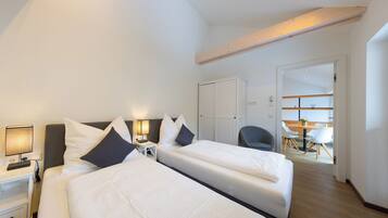 Apartment, 2 Bedrooms | Blackout drapes, soundproofing, iron/ironing board, free WiFi