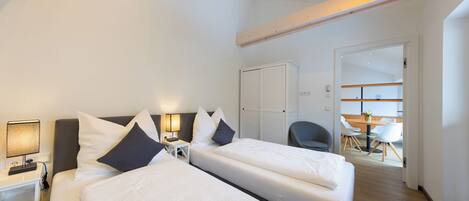 Apartment, 2 Bedrooms | Blackout drapes, soundproofing, iron/ironing board, free WiFi