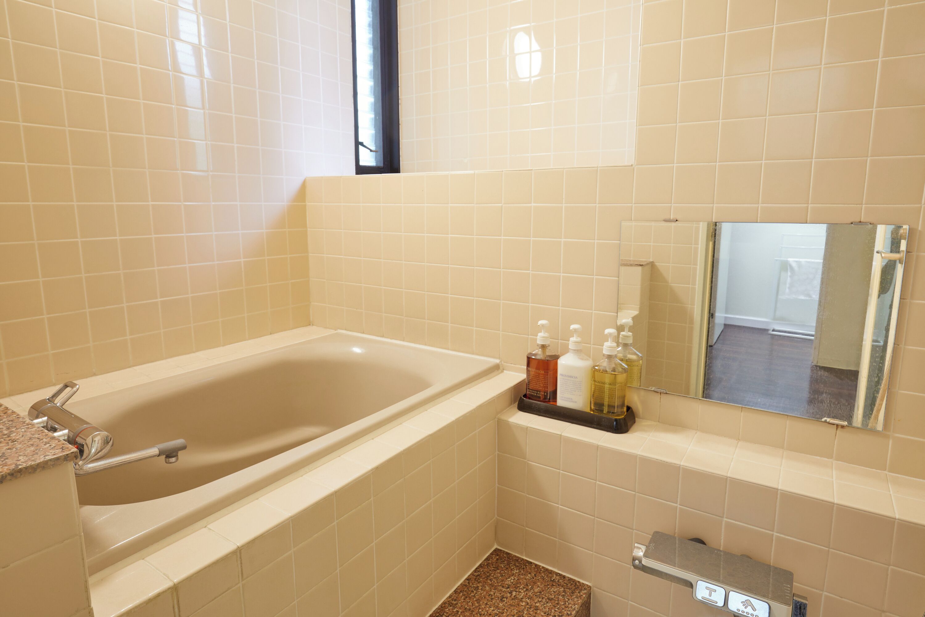 family suite | bathroom | slippers, towels