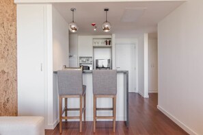 Comfort Apartment | Private kitchen | Full-size fridge, microwave, oven, stovetop