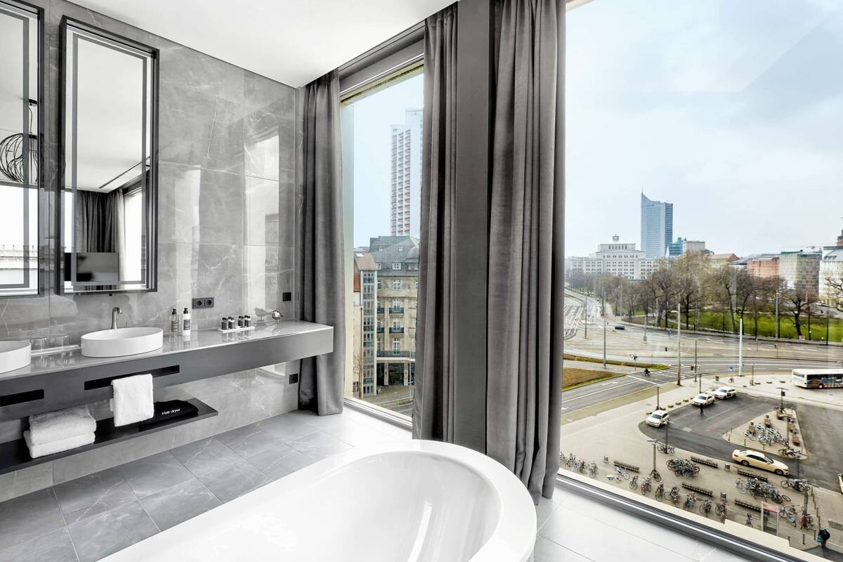 suite | bathroom | shower, rainfall showerhead, designer toiletries, hair dryer