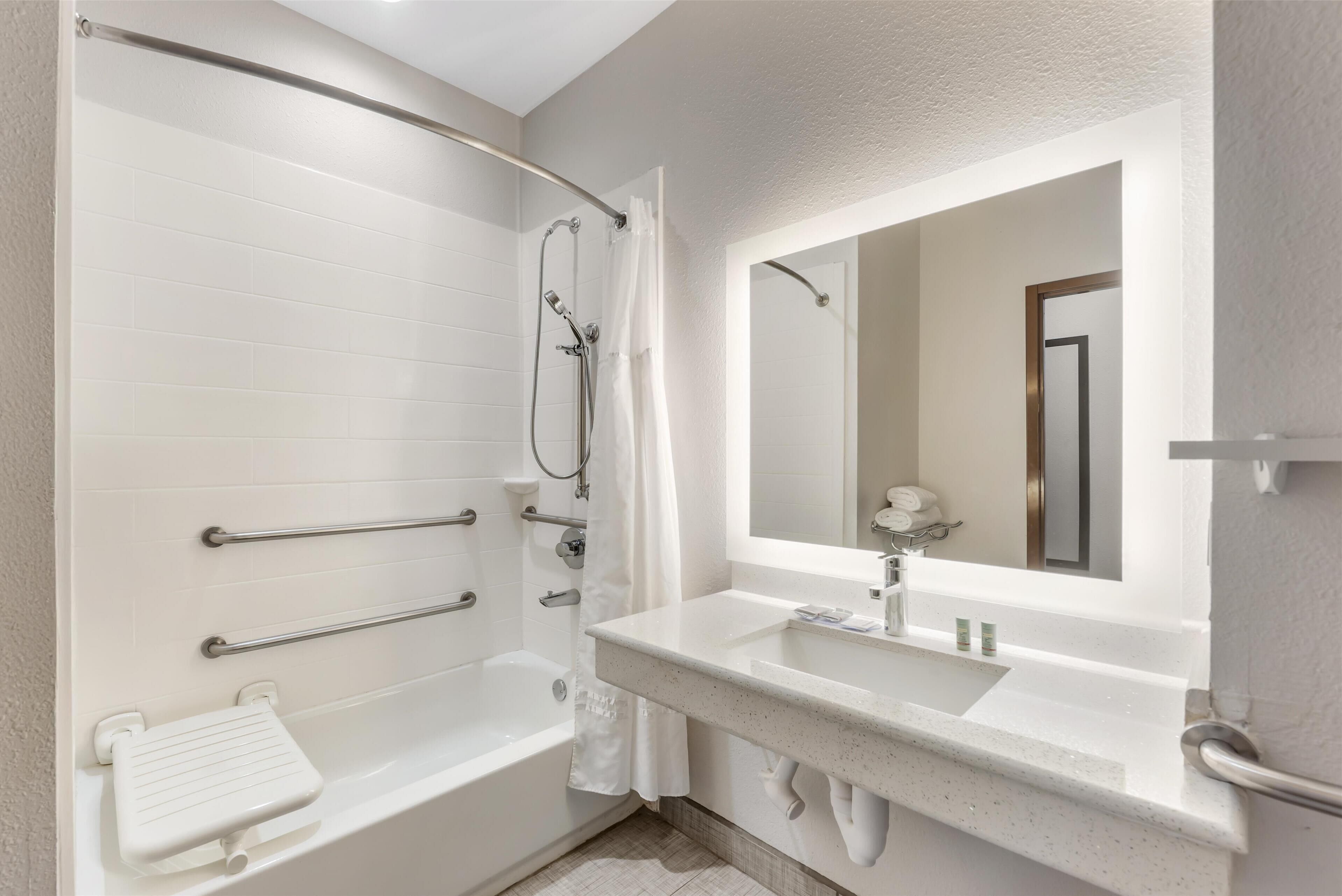 standard room, 2 queen beds, accessible, refrigerator & microwave | bathroom | combined shower/bathtub, free toiletries, hair dryer, towels