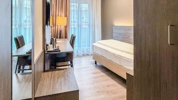 Standard Single Room | 1 bedroom, minibar, in-room safe, desk
