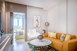 Apartment, 1 Bedroom | Living area | 48-inch flat-screen TV with satellite channels, TV