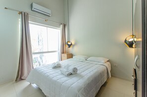 Apartamento urbano | 2 quartos, cortinas blackout, ferros/tábuas de passar roupa