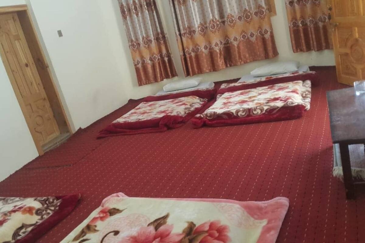Economy Quadruple Room | Down comforters, blackout drapes, iron/ironing board (on request)