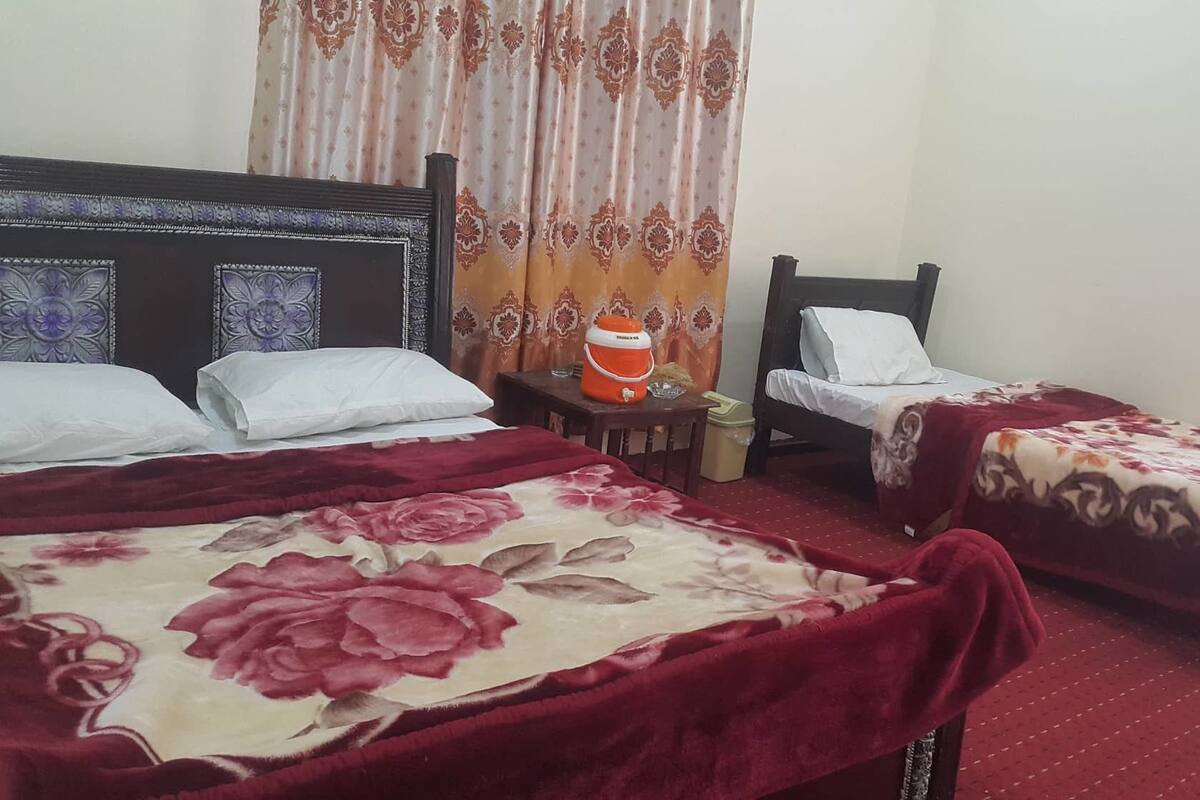 Family Triple Room | Down comforters, blackout drapes, iron/ironing board (on request)