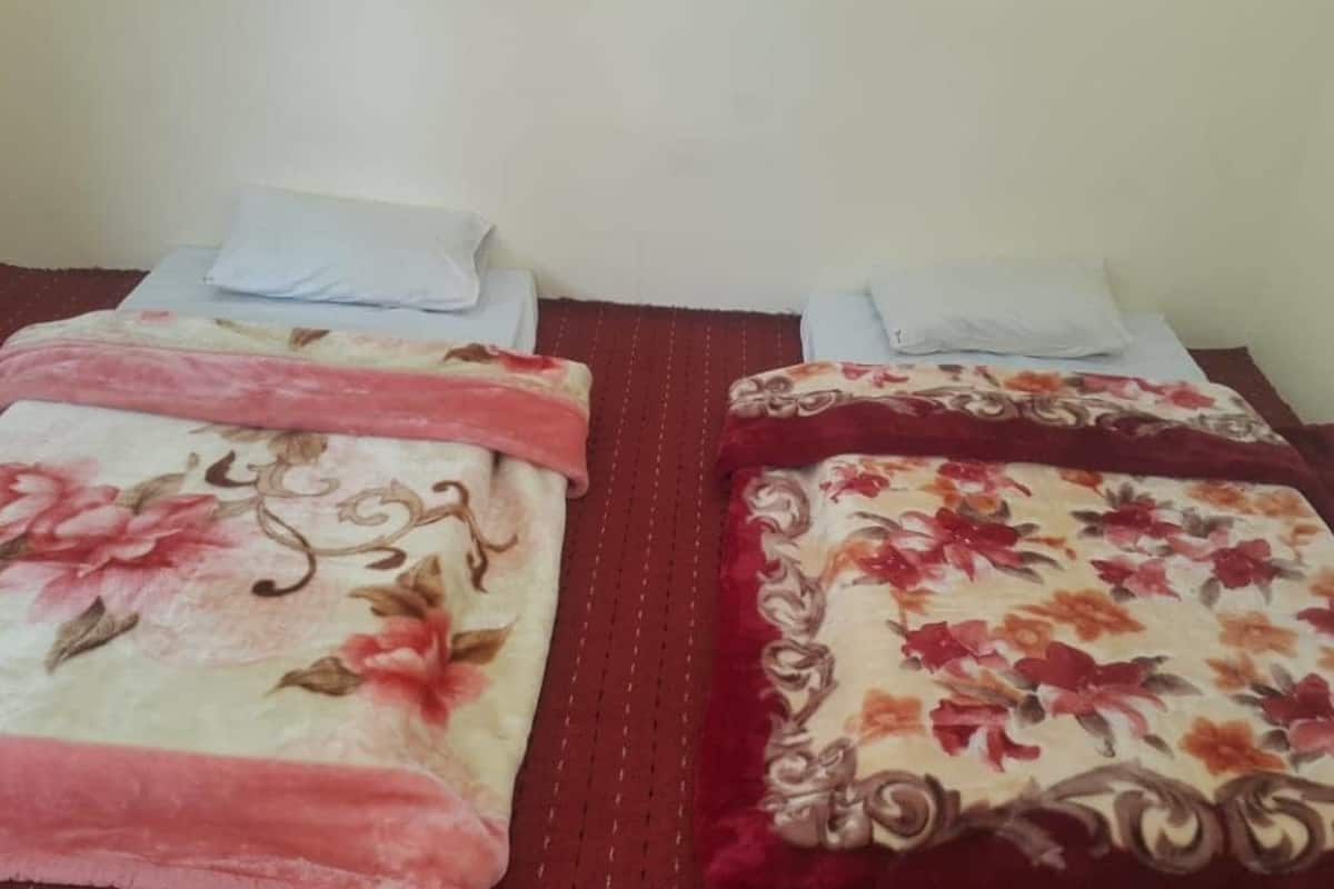 Economy Twin Room | Down comforters, blackout drapes, iron/ironing board (on request)